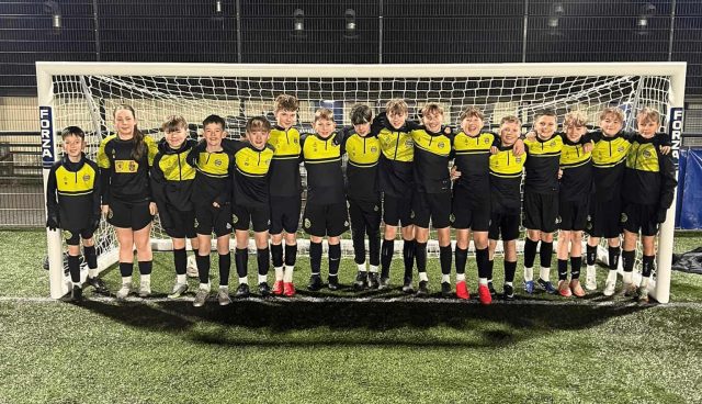 A line of young footballers from Strathaven Dynamo's